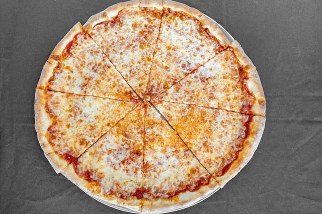 Monday/Tuesday & Wednesday Large Pizza Special.
